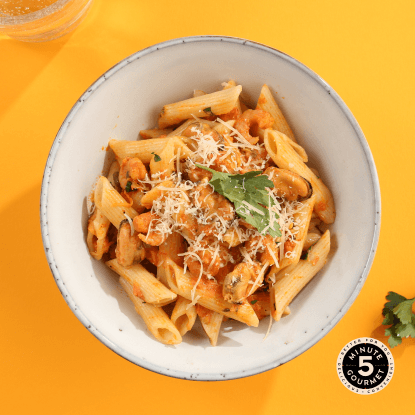 Penne with seafood meal presentation